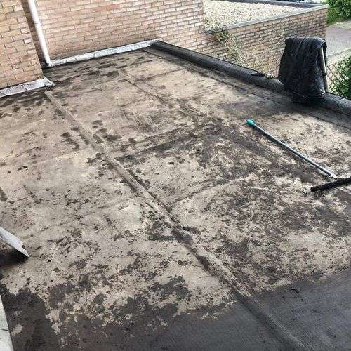 Schoonmaken van een plat dak in Hulst Schoonmaken van een plat dak in Hulst